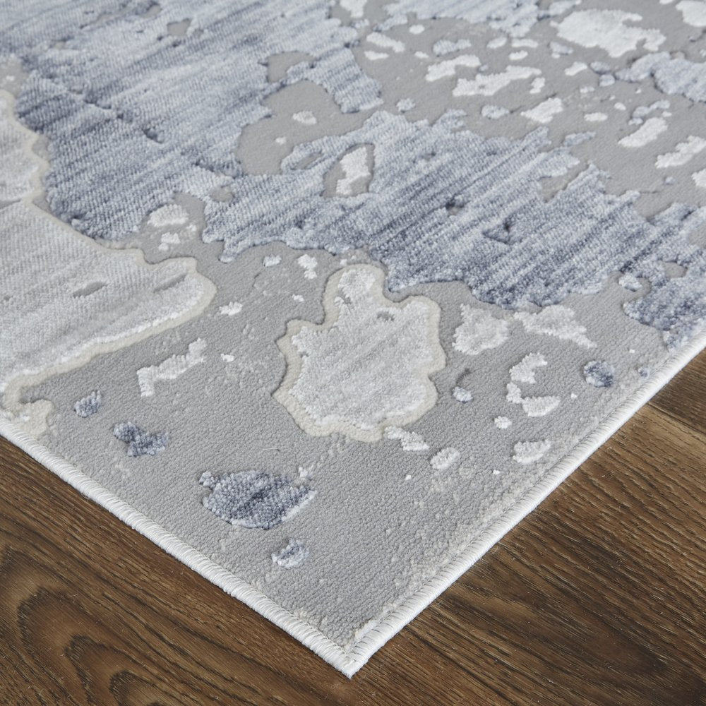 2' X 3' Ivory And Blue Abstract Power Loom Distressed Area Rug