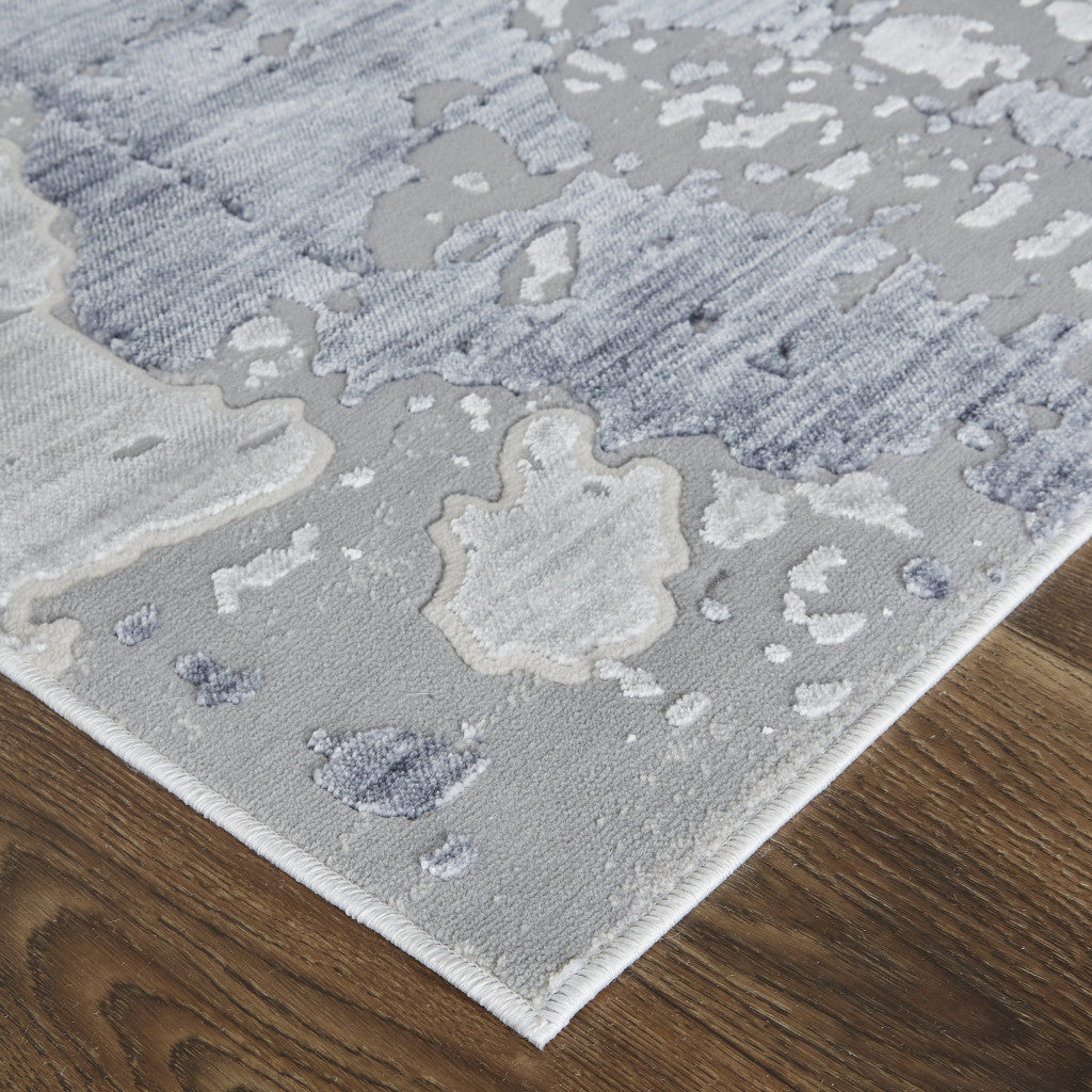 8' X 10' Ivory And Blue Abstract Power Loom Distressed Area Rug