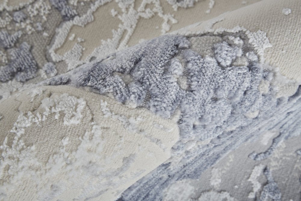 4' X 6' Ivory And Blue Abstract Power Loom Distressed Area Rug