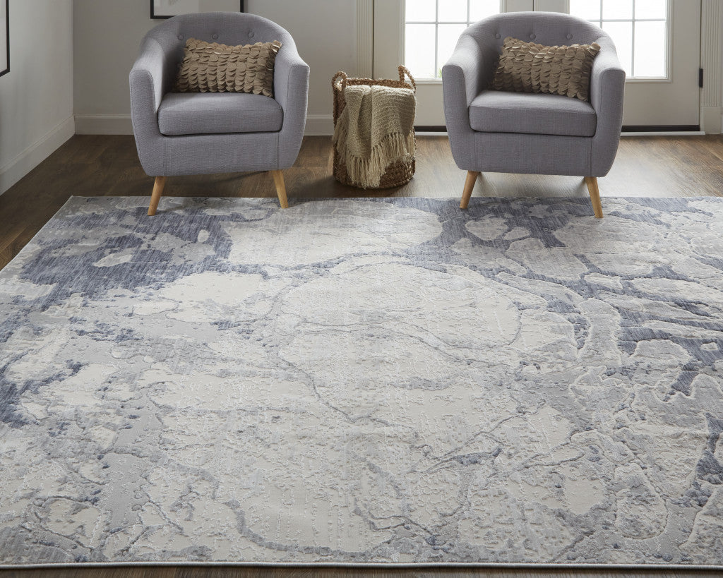 8' X 10' Ivory And Blue Abstract Power Loom Distressed Area Rug