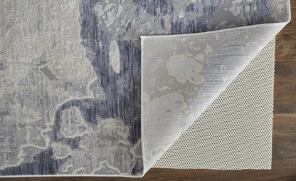 2' X 3' Ivory And Blue Abstract Power Loom Distressed Area Rug