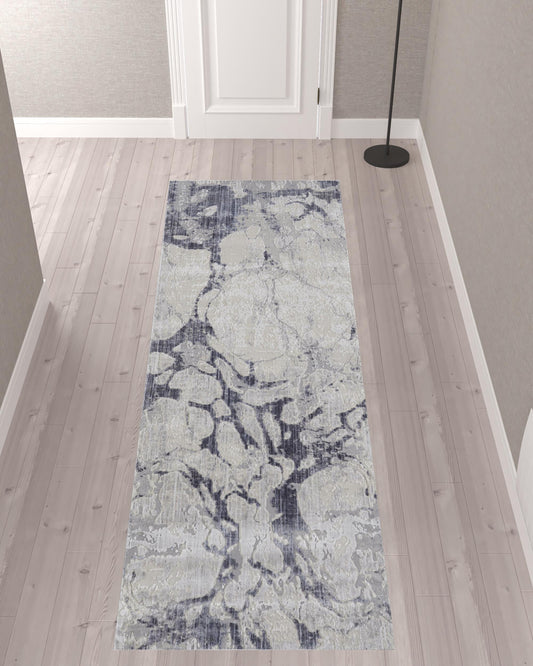 8' Tan And Blue Abstract Power Loom Distressed Runner Rug