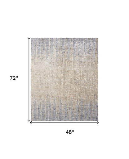 2' X 3' Tan And Blue Abstract Distressed Area Rug