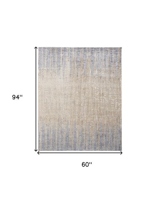 4' X 6' Tan Brown And Blue Abstract Power Loom Distressed Area Rug