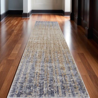 5' X 8' Tan And Blue Abstract Distressed Area Rug