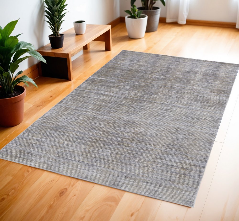 4' X 6' Taupe Silver And Tan Abstract Power Loom Area Rug