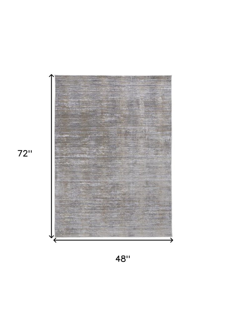 10' X 13' Taupe Silver And Tan Abstract Power Loom Area Rug