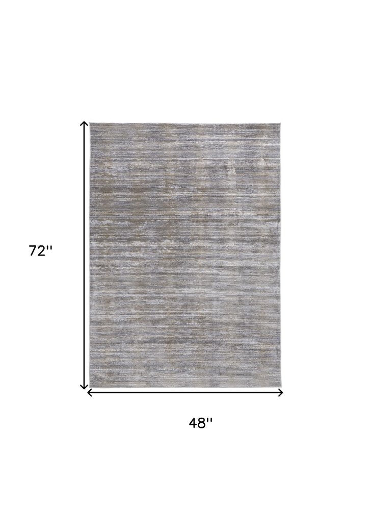 4' X 6' Taupe Silver And Tan Abstract Power Loom Area Rug