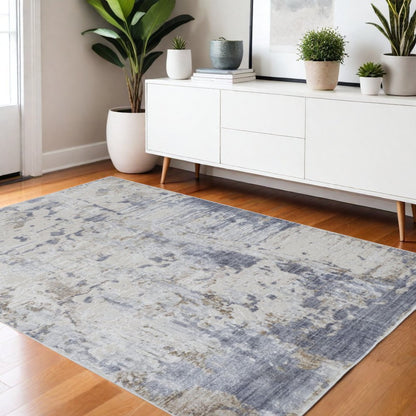 4' X 6' Ivory Gray And Blue Abstract Distressed Area Rug