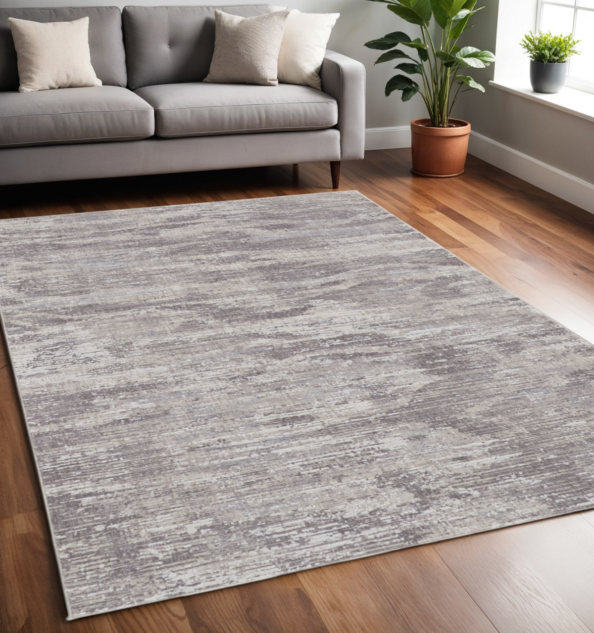 8' X 10' Tan and Gray Abstract Power Loom Distressed Area Rug