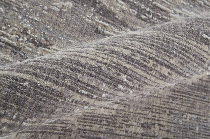 5' X 8' Tan And Gray Abstract Distressed Area Rug