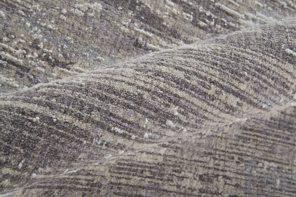 5' X 8' Tan And Gray Abstract Distressed Area Rug