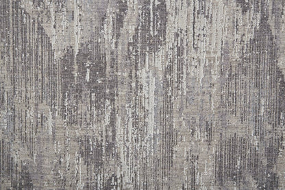 5' X 8' Tan And Gray Abstract Distressed Area Rug