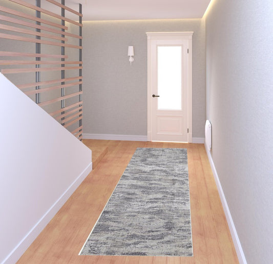 5' X 8' Tan And Gray Abstract Distressed Area Rug