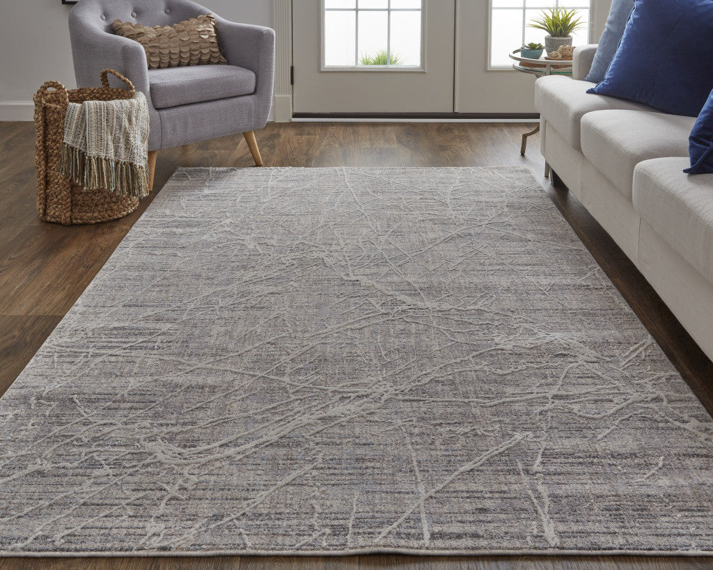 4' X 6' Taupe And Gray Abstract Power Loom Distressed Stain Resistant Area Rug