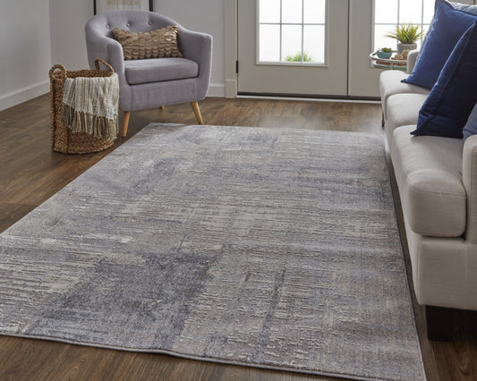 8' X 10' Taupe Tan And Blue Abstract Power Loom Distressed Stain Resistant Area Rug