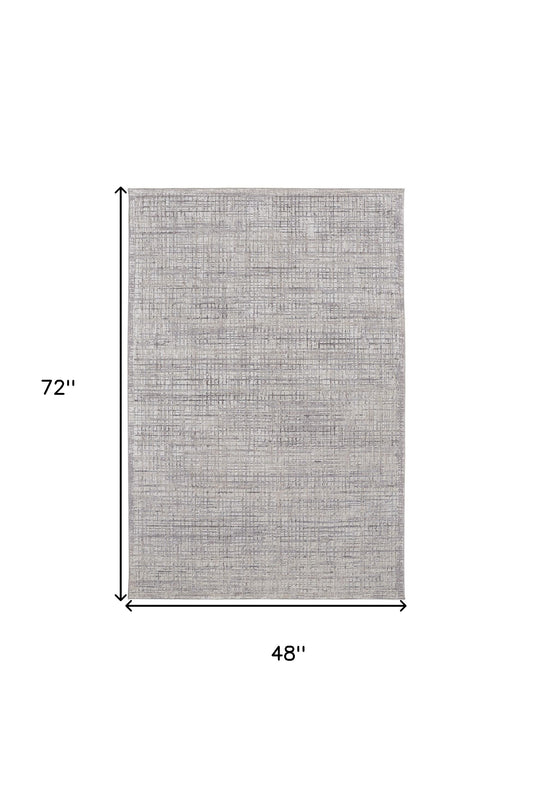 8' X 10' Taupe And Ivory Plaid Power Loom Distressed Stain Resistant Area Rug