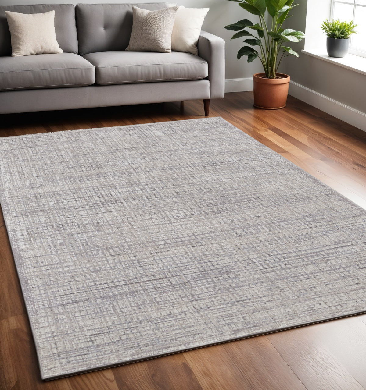 8' X 10' Taupe and Ivory Plaid Power Loom Distressed Area Rug