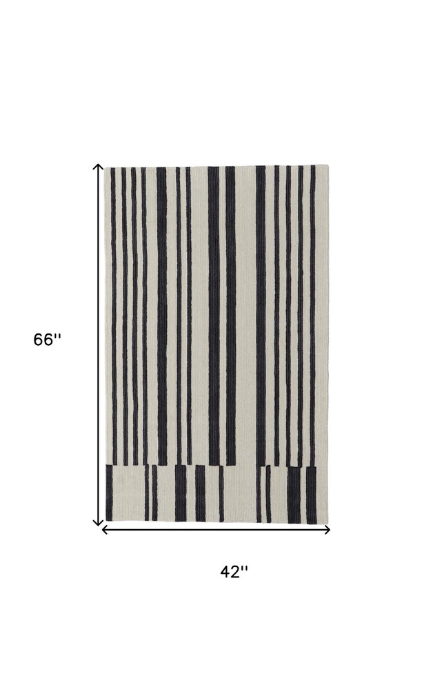 5' X 8' Ivory and Black Wool Abstract Hand Tufted Area Rug