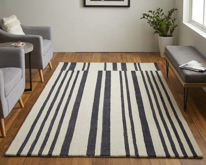 5' X 8' Ivory and Black Wool Abstract Hand Tufted Area Rug