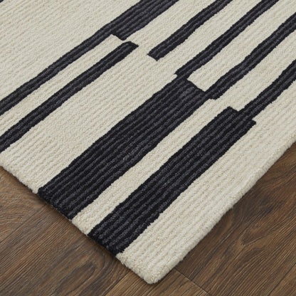 5' X 8' Ivory and Black Wool Abstract Hand Tufted Area Rug