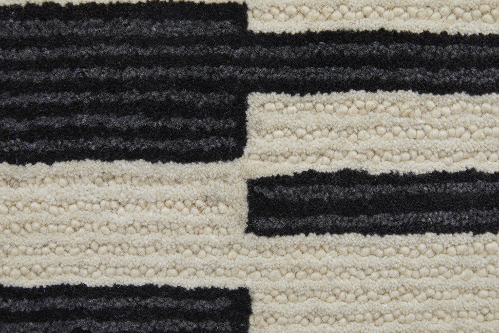 4' X 6' Ivory and Black Wool Abstract Hand Tufted Area Rug