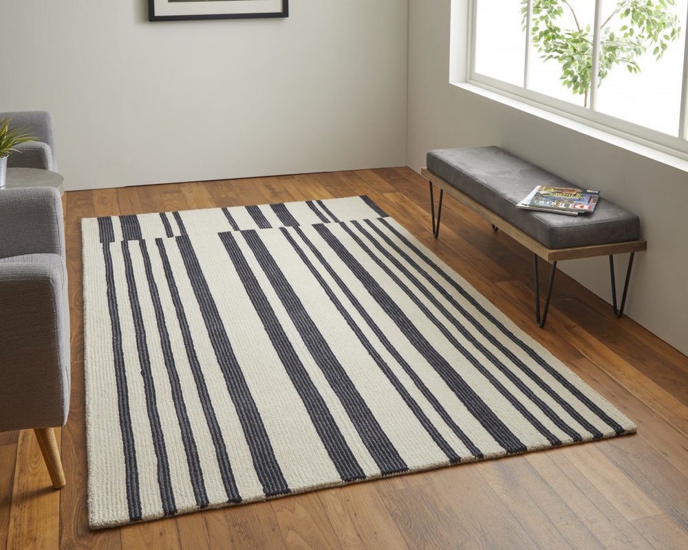 5' X 8' Ivory and Black Wool Abstract Hand Tufted Area Rug