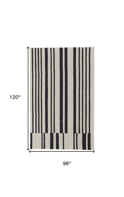 5' X 8' Ivory and Black Wool Abstract Hand Tufted Area Rug