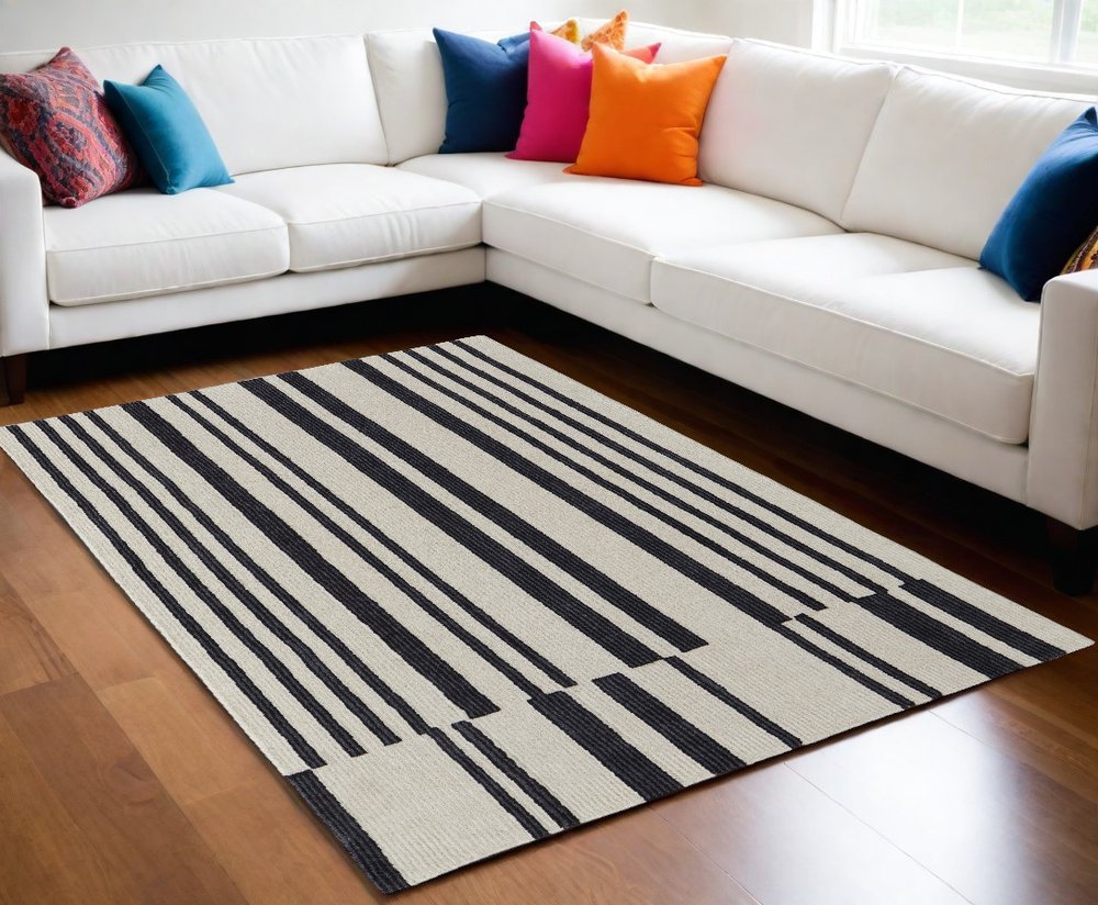 5' X 8' Ivory and Black Wool Abstract Hand Tufted Area Rug