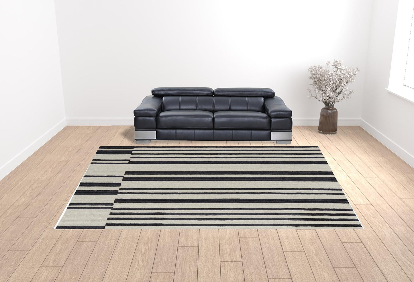 4' x 6' Ivory and Black Wool Abstract Hand Tufted Area Rug