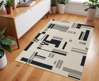 4' X 6' Ivory Black And Gray Wool Abstract Hand Tufted Area Rug