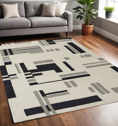 4' X 6' Ivory Black And Gray Wool Abstract Hand Tufted Area Rug