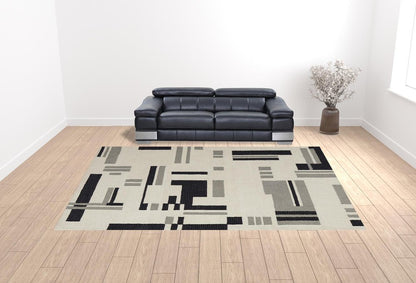 4' X 6' Ivory Black And Gray Wool Abstract Hand Tufted Area Rug