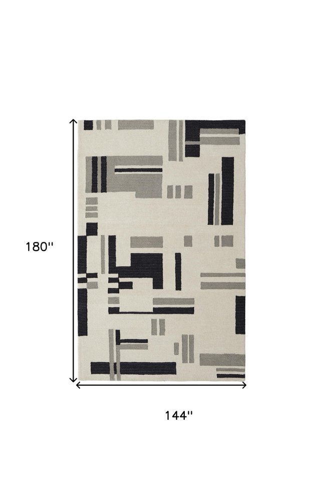 4' X 6' Ivory Black And Gray Wool Abstract Hand Tufted Area Rug