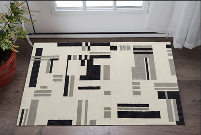 4' X 6' Ivory Black And Gray Wool Abstract Hand Tufted Area Rug