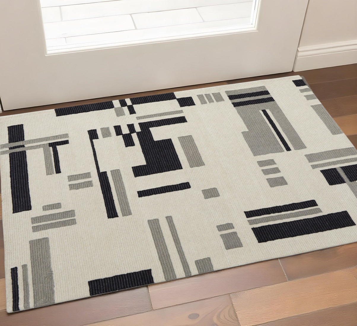 4' X 6' Ivory Black And Gray Wool Abstract Hand Tufted Area Rug