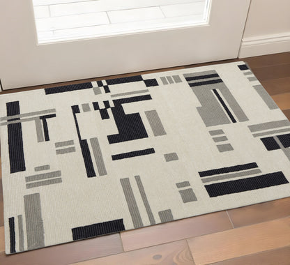 4' X 6' Ivory Black And Gray Wool Abstract Hand Tufted Area Rug