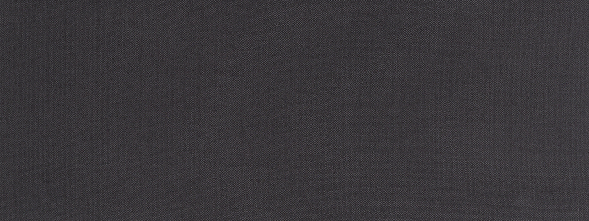 Close-up of charcoal gray upholstery fabric texture with a fine weave.