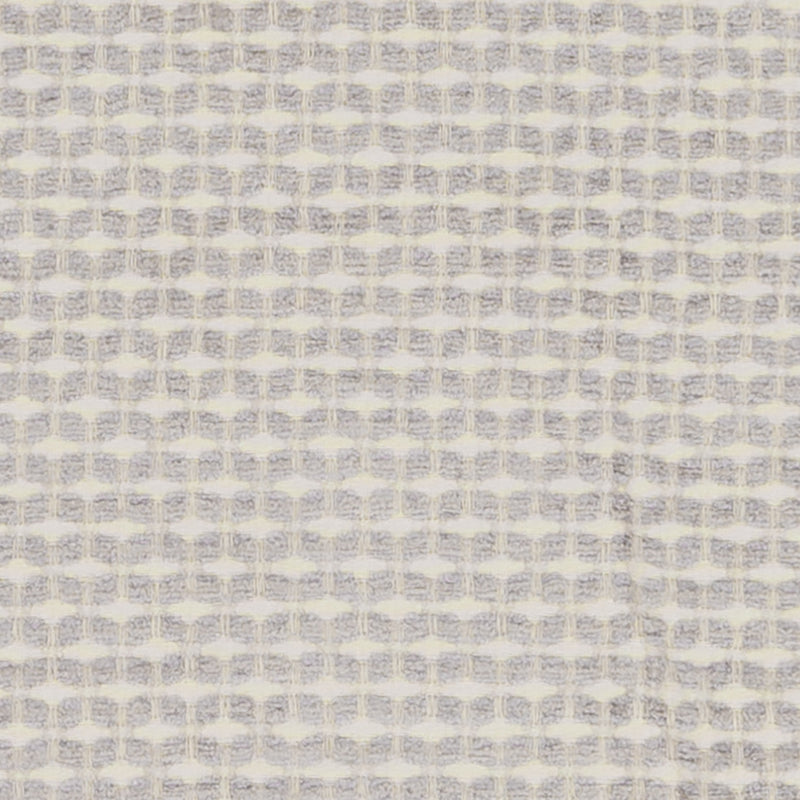 Vanilla woven upholstery fabric with a small white grid pattern.
