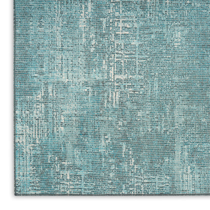 8′×10′ Botanical Washables area rug by Nourison Home in green with abstract botanical flat-weave pattern, machine washable, modern indoor area rug