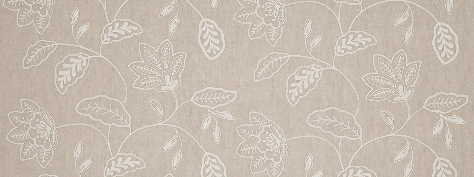 Beige linen-look drapery fabric featuring a white botanical floral vine pattern.