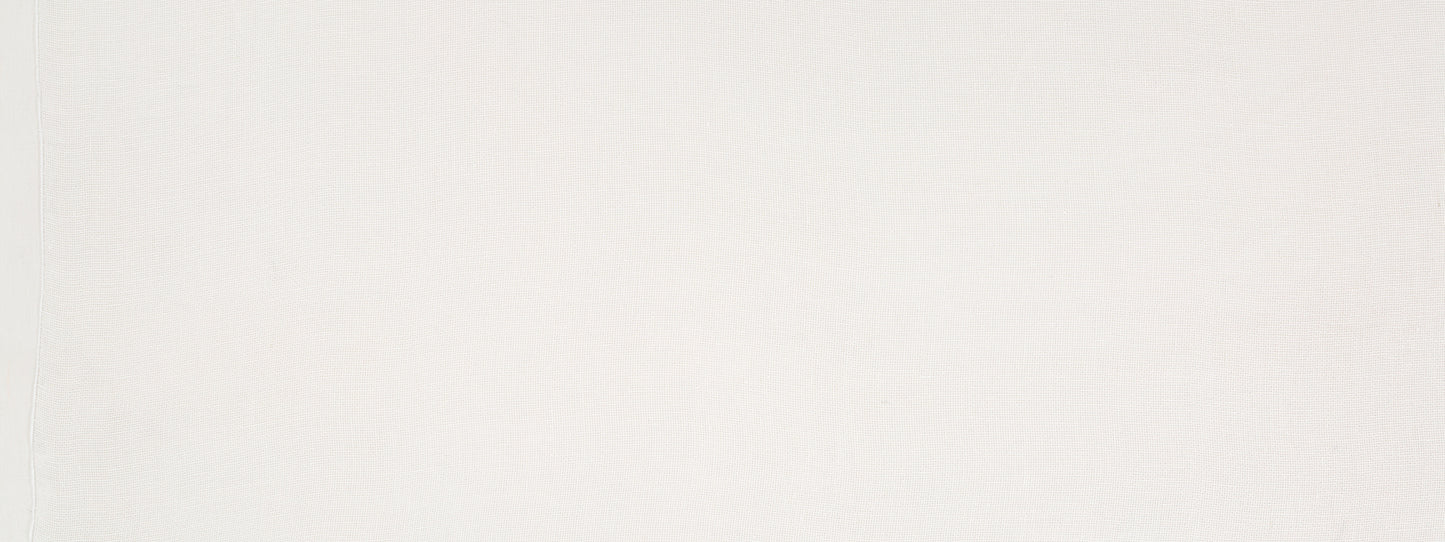 Soft pale cream textured drapery fabric with subtle shading; neutral backdrop.