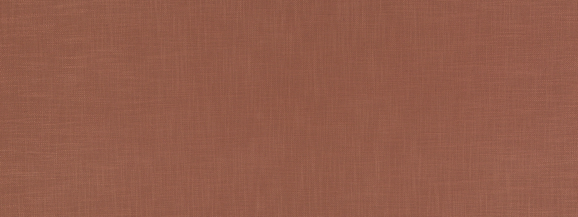 Persimmon upholstery fabric with a linen-like weave in a warm terracotta color; ideal for upholstery or crafts.