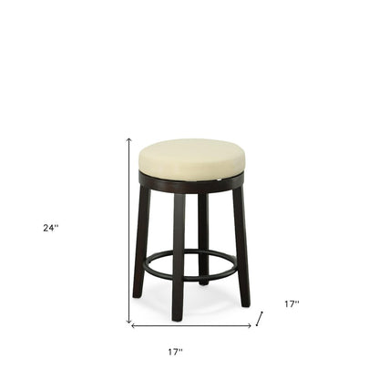 Set of Two 24" Cream and Espresso Faux Leather and Solid Wood Backless Counter Height Swivel Bar Chairs
