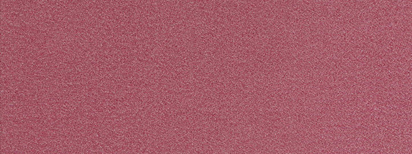 Soft pink textured fabric close-up with fine grain, suede-like surface.