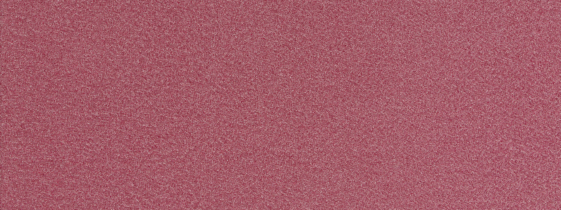 Soft pink textured fabric close-up with fine grain, suede-like surface.