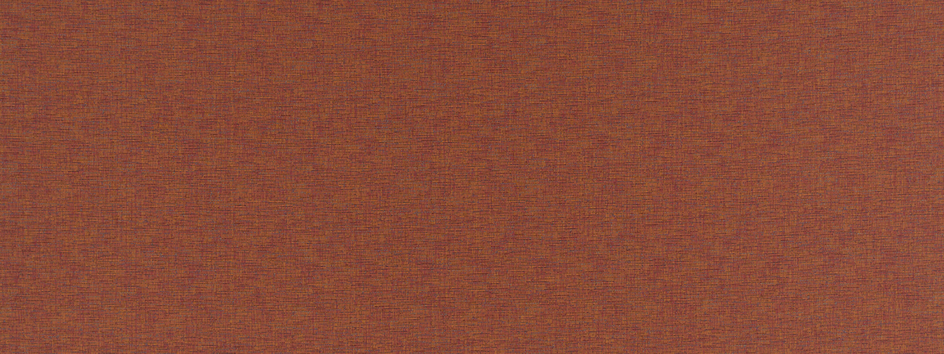 Warm terracotta brown textured fabric with subtle speckling