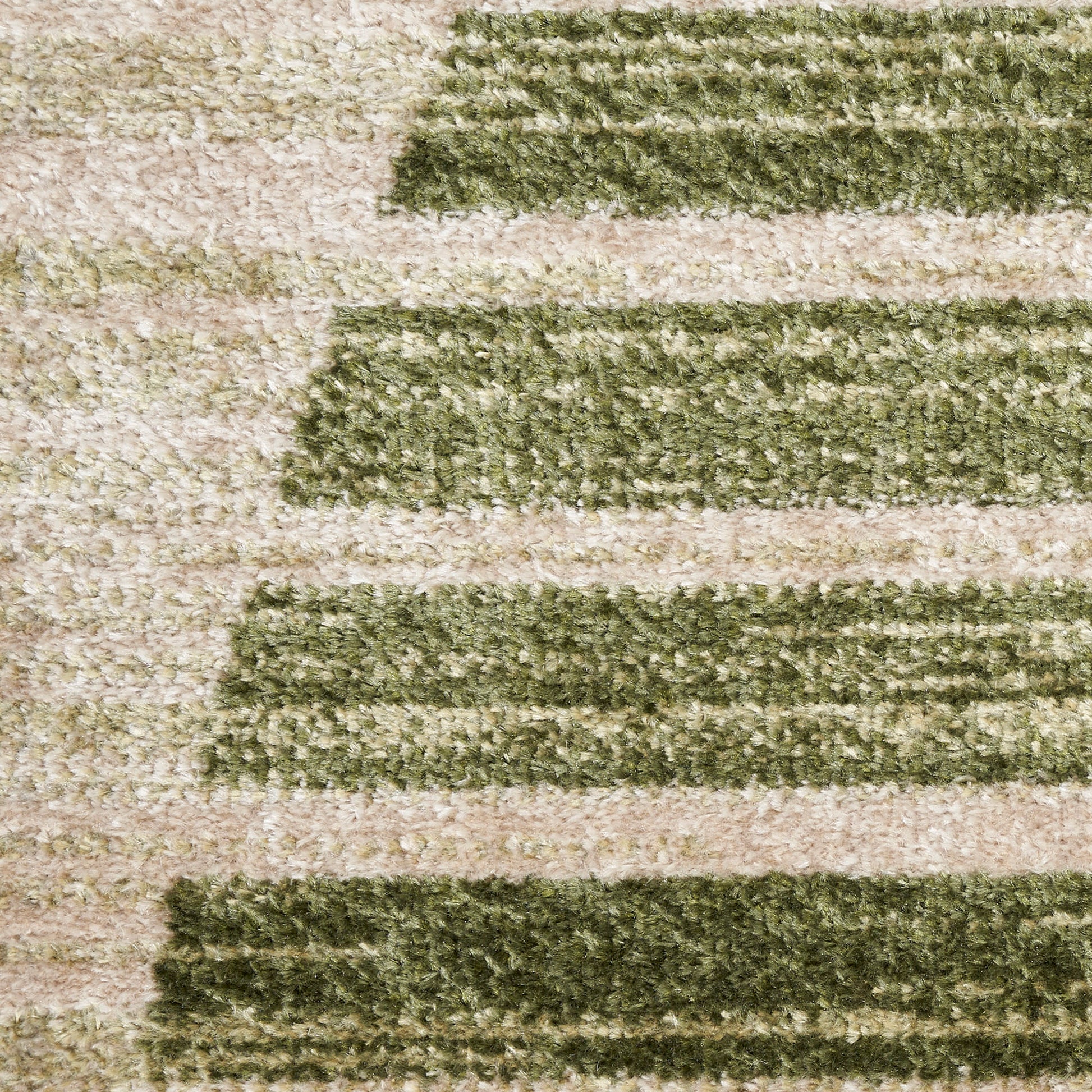 Beige & olive green striped shag rug with a plush, textured pile in a mid-century modern style.