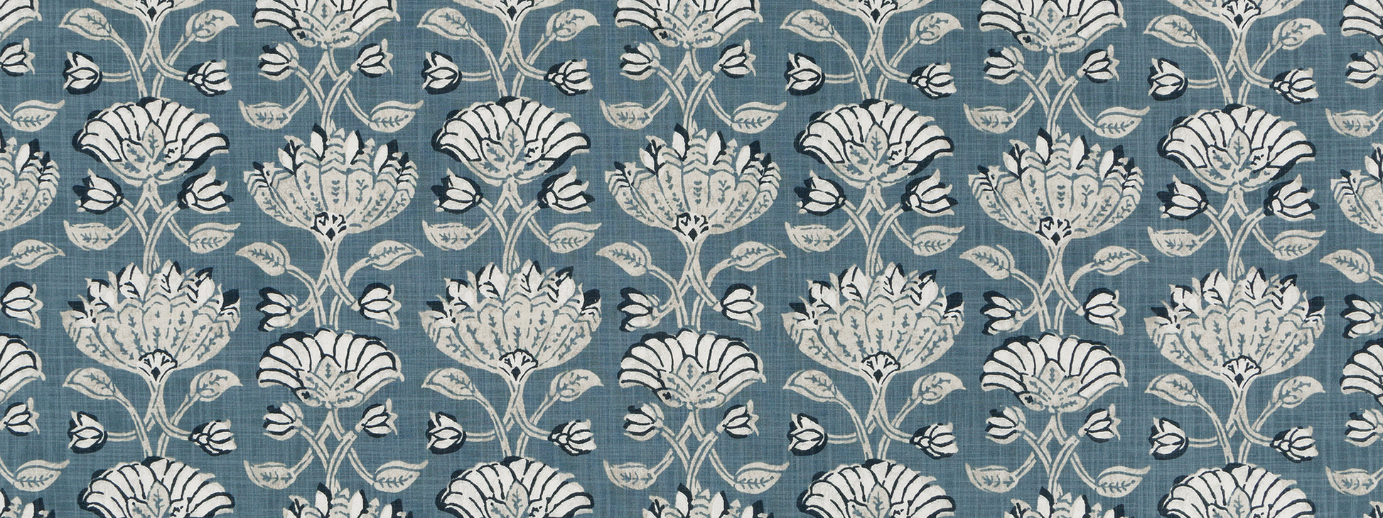 Blue wallpaper featuring a white ornate damask floral pattern.