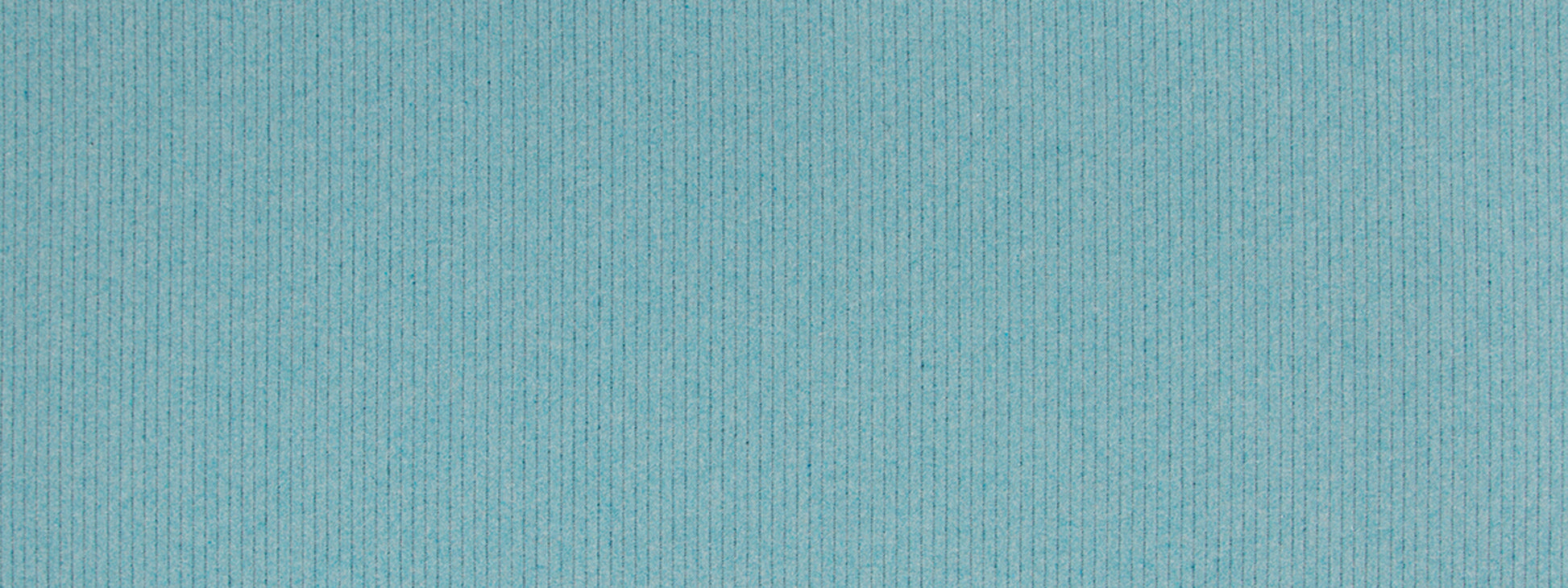 Light blue ribbed fabric close-up with subtle vertical ridges; upholstery fabric.